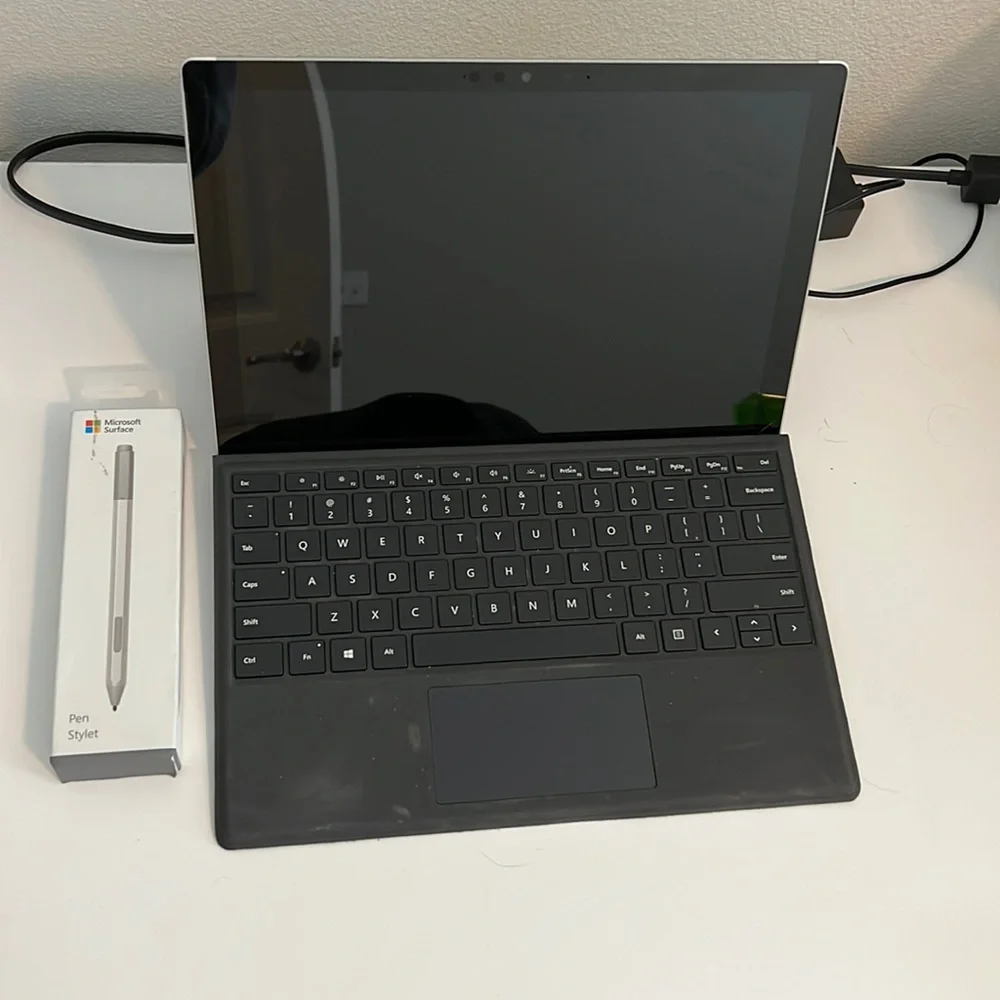 Microsoft surface pro 7 (model 1866) with magnetic keyboard and pen stylet